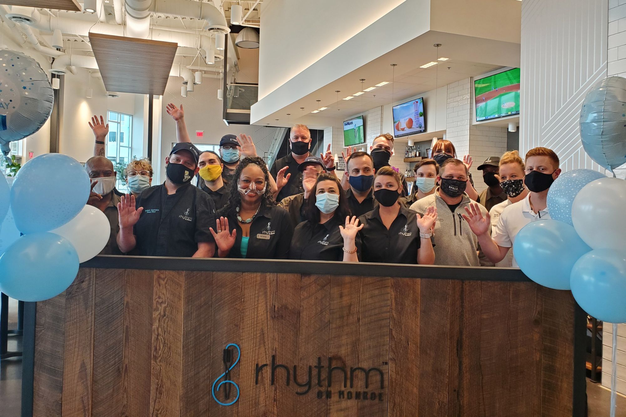 Photo of Rhythm On Monroe staff celebrating one year anniversary