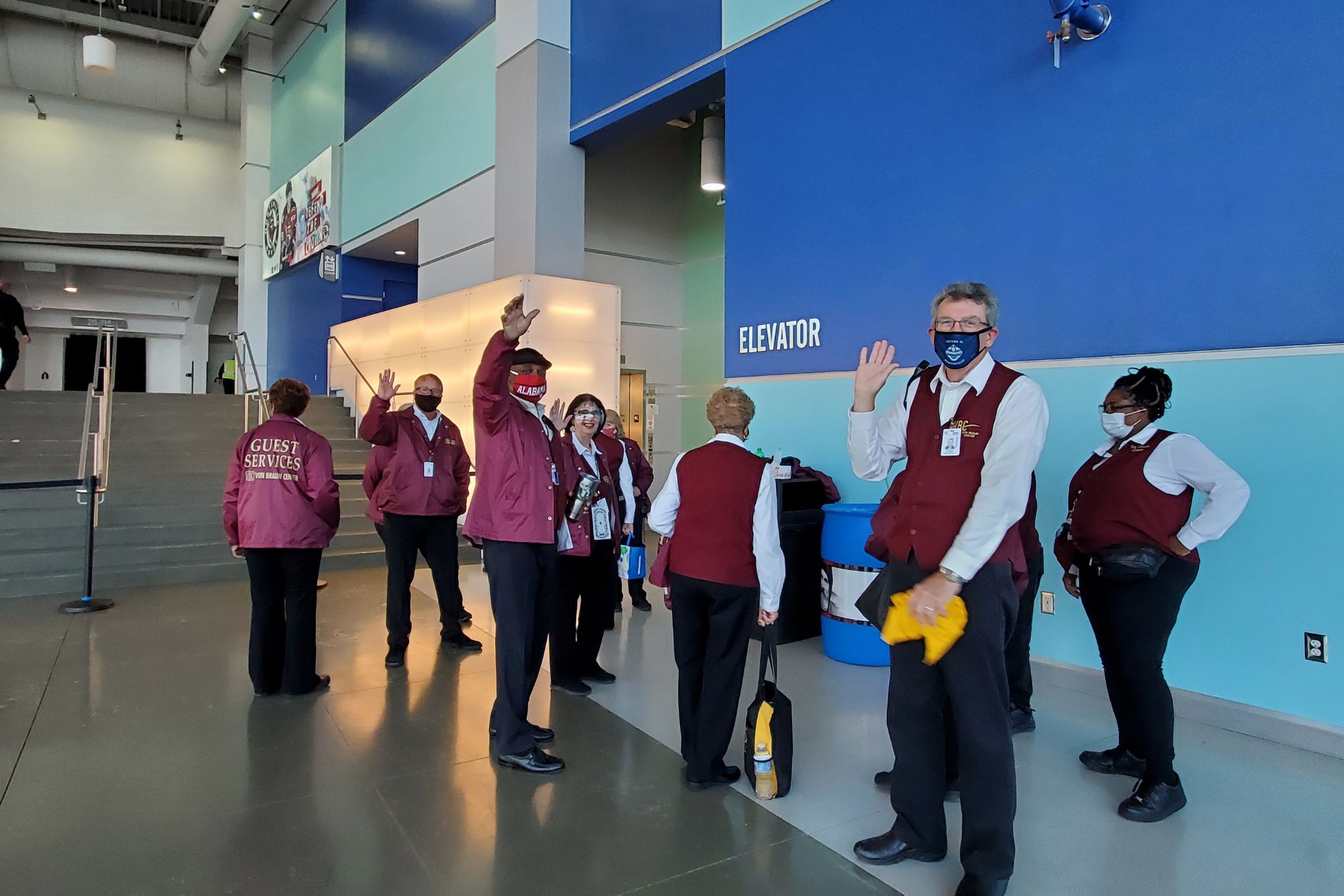 Photo of guest services team wearing face masks