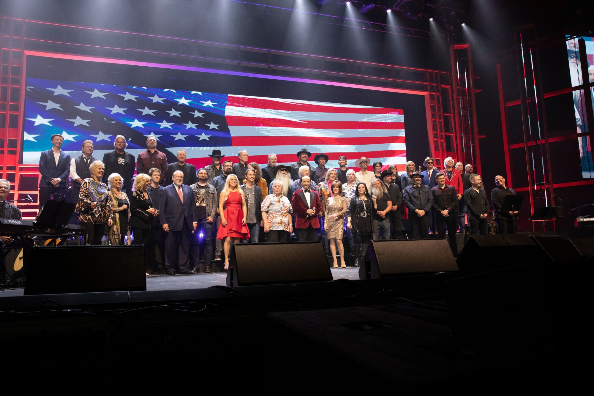 Photo of all performers onstage with Lee Greenwood during All Star Salute in the VBC Propst Arena