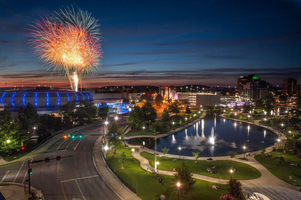 Photo of VBC Propst Arena lights and Big Spring Park during nighttime fireworks show