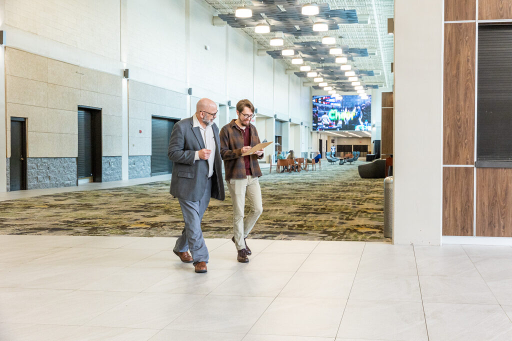 Image of two guests walking through the hallway