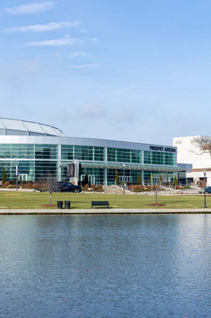 Exterior image of the Propst Arena across the canal from Big Spring Park