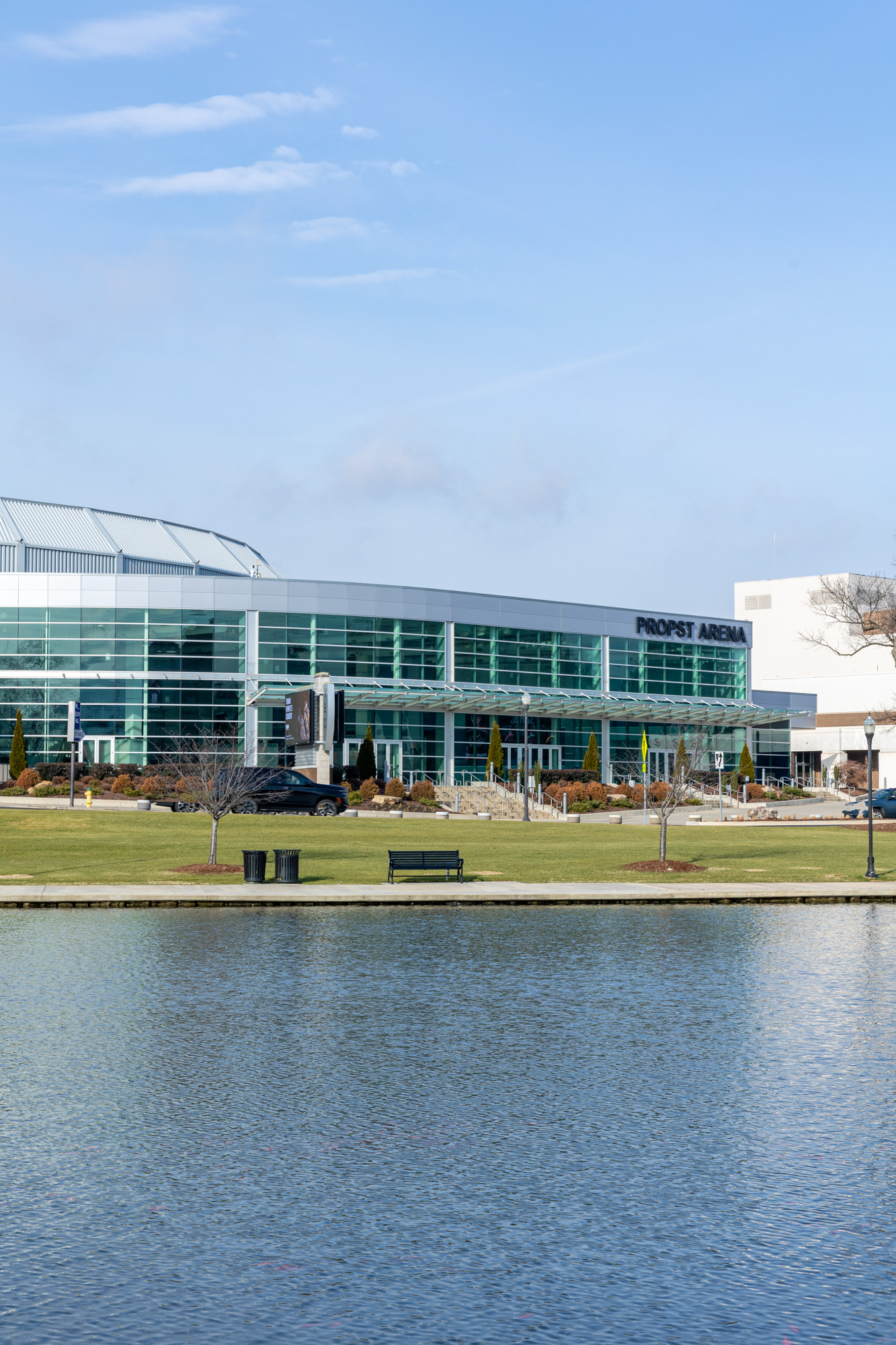 Exterior image of the Propst Arena across the canal from Big Spring Park