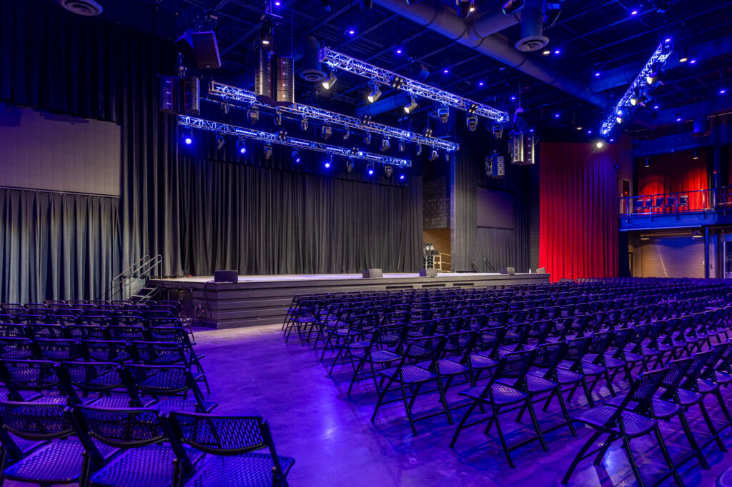 Image of Mars Music Hall with chairs on the floor for a seated event