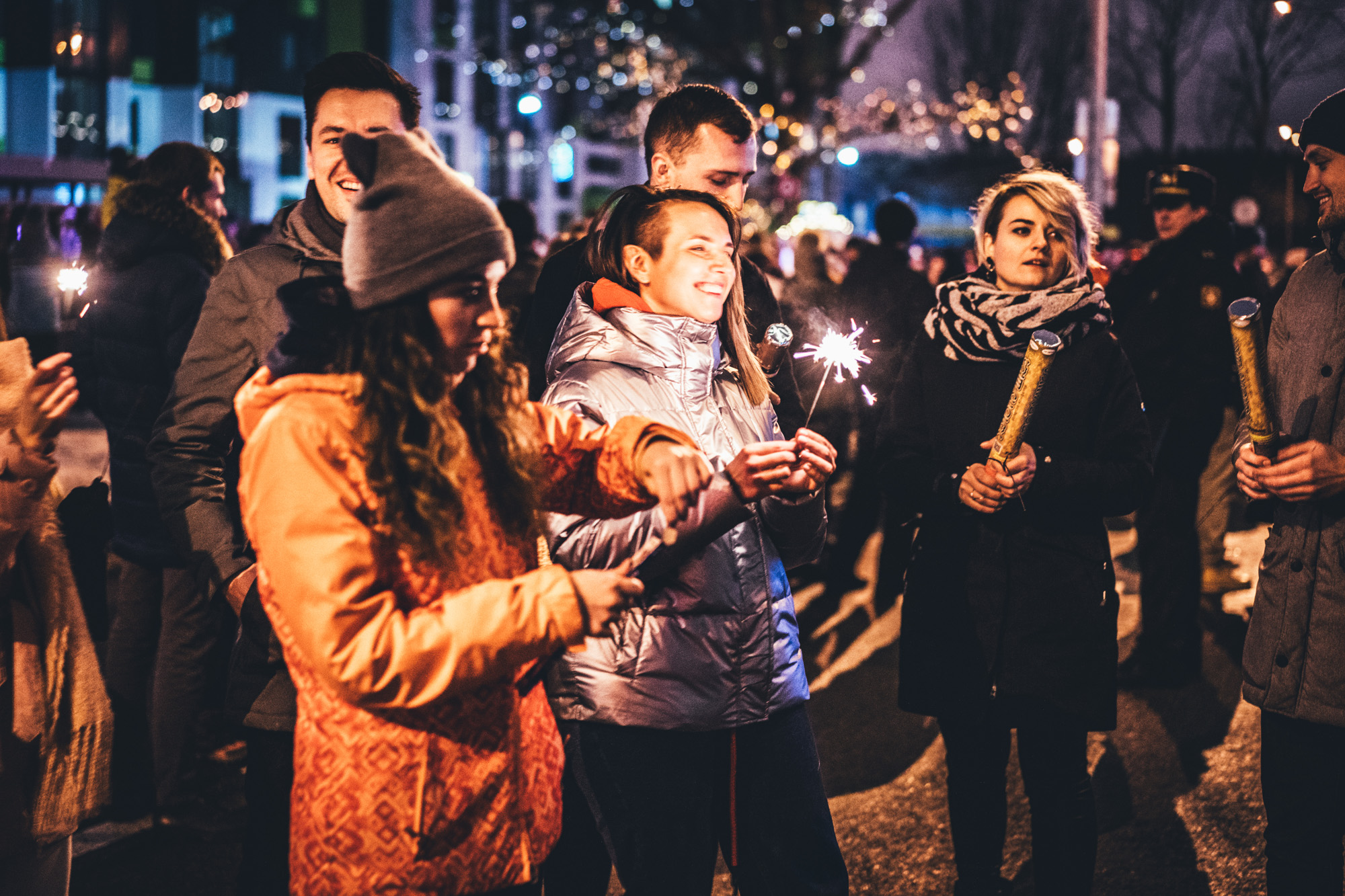 Image of guests outside holding sparklers