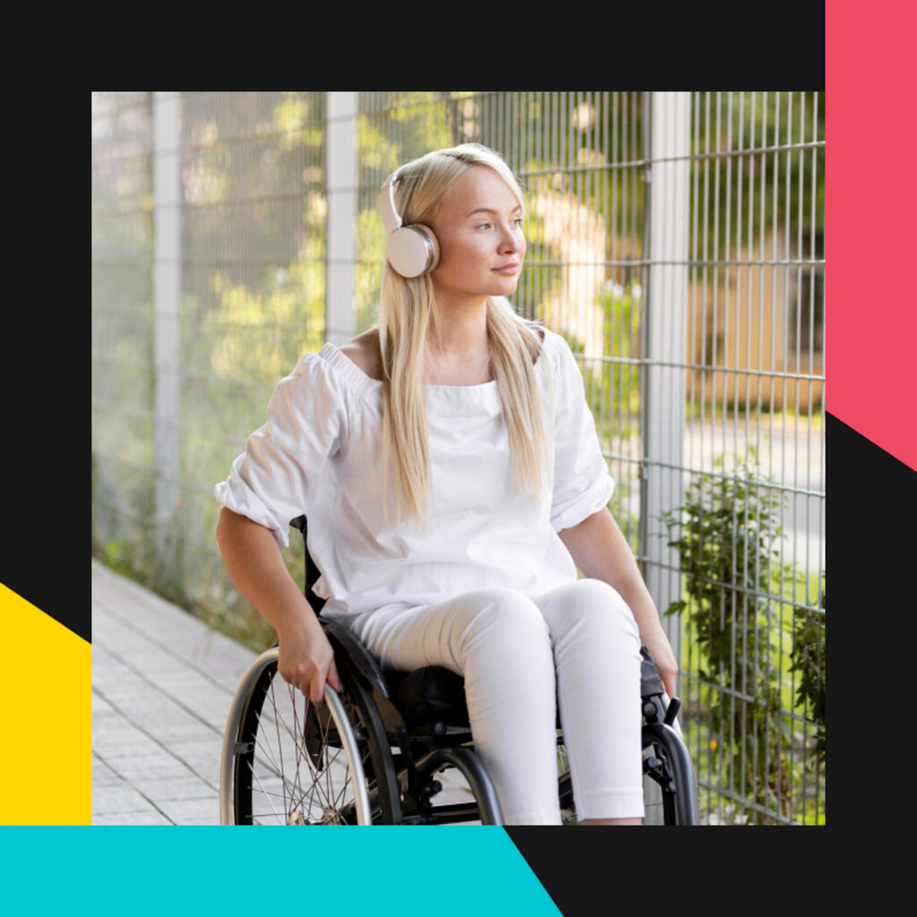 Photo of guest in wheelchair with headphones