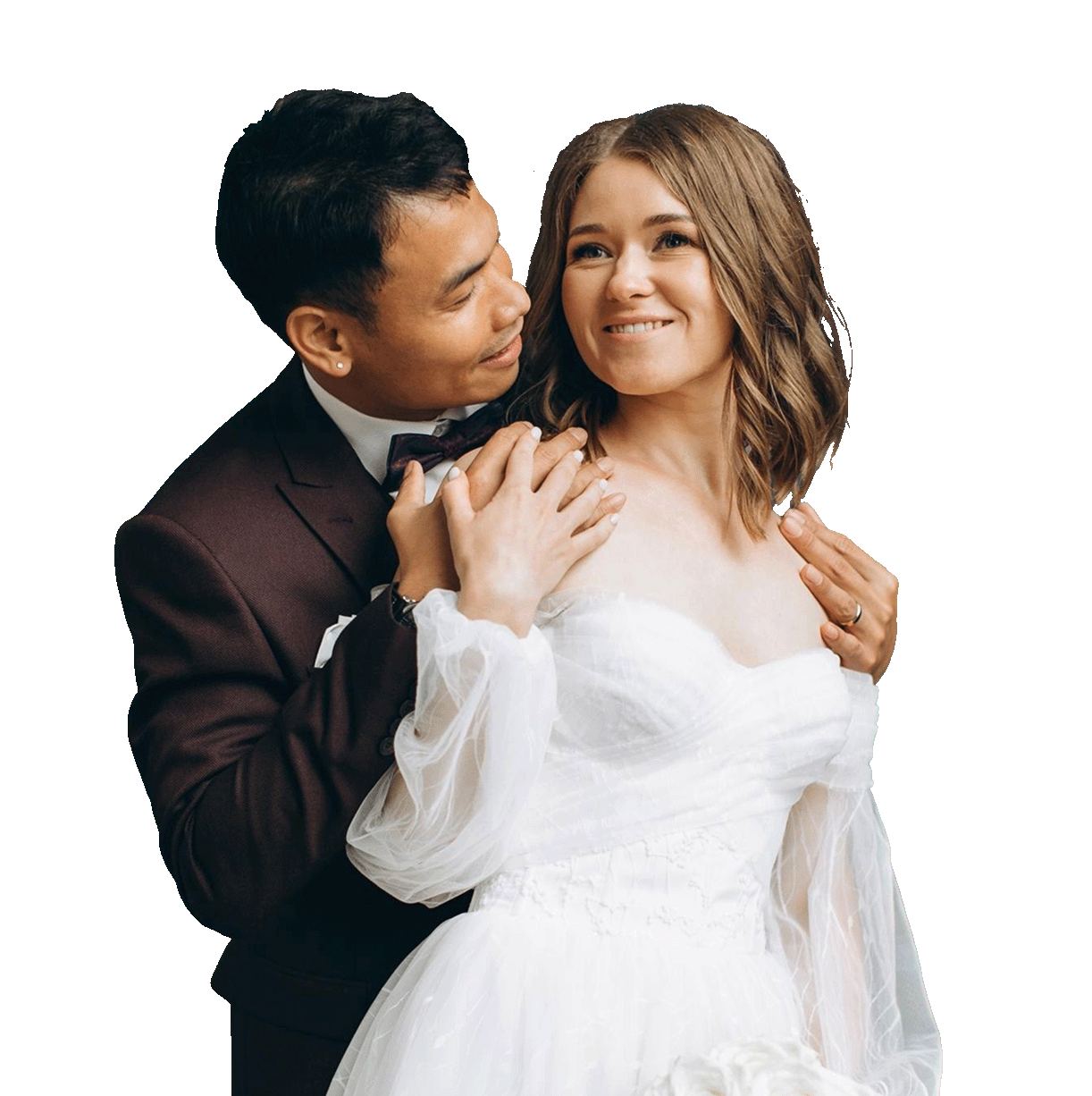 Image of a bride and groom posing for wedding portraits