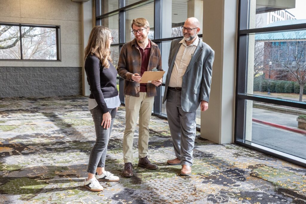 Photo of client planning an event with VBC staff