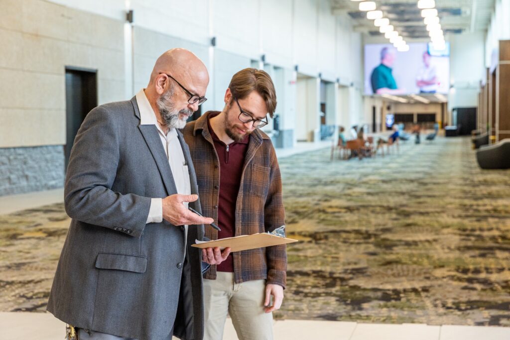 Image of guests collaborating at a conference