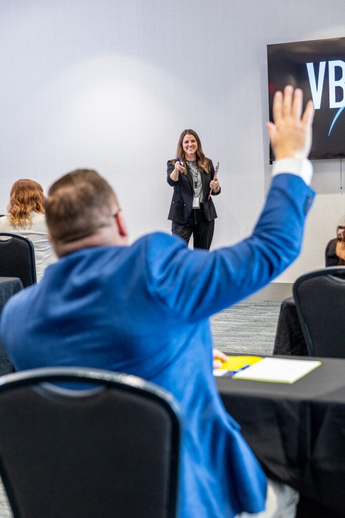 Image of guest raising hand during meeting