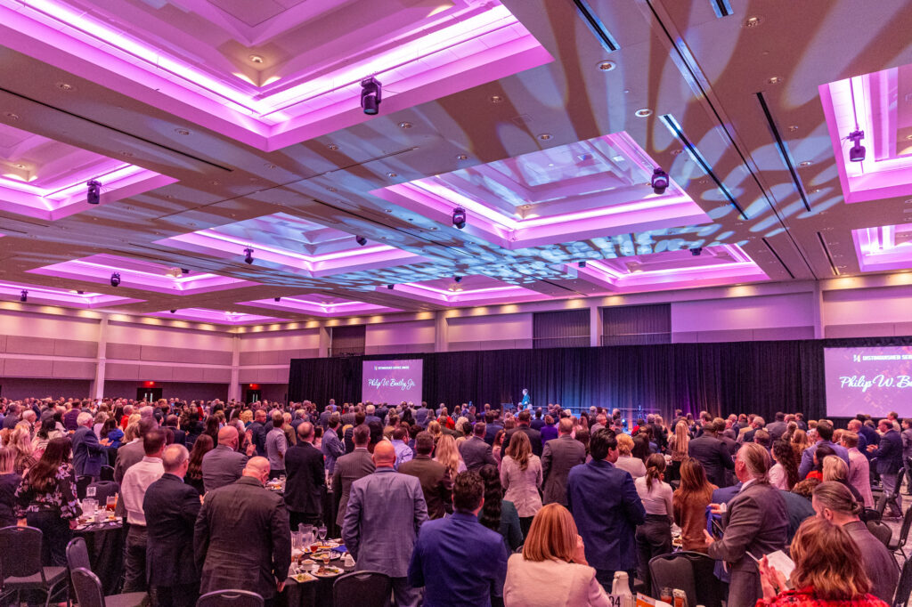 Photo of banquet seating with an event in Saturn Ballroom