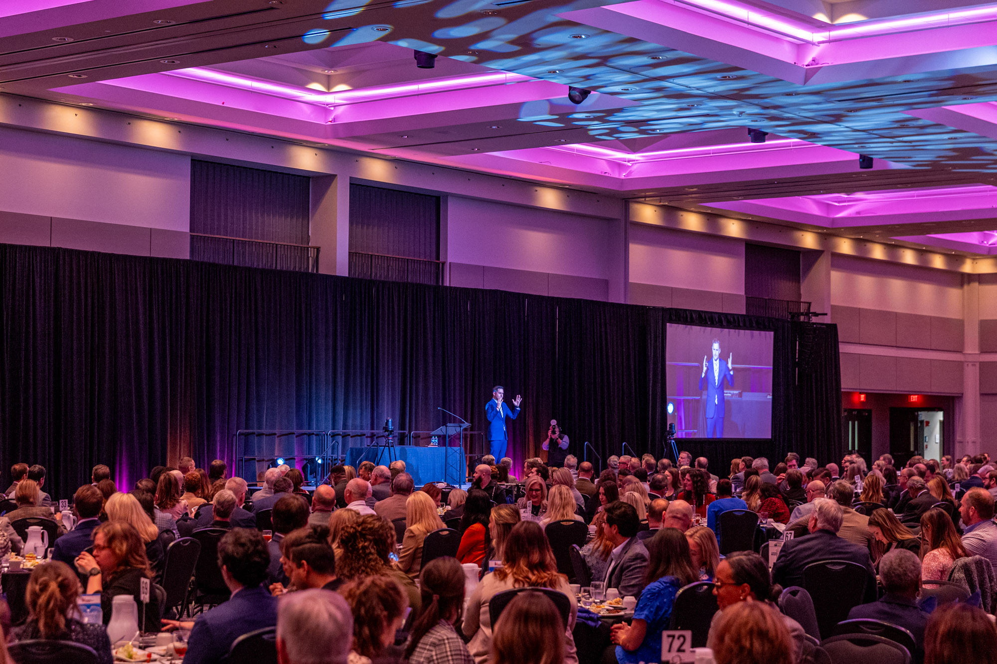Photo of guest speaker with an event in Saturn Ballroom