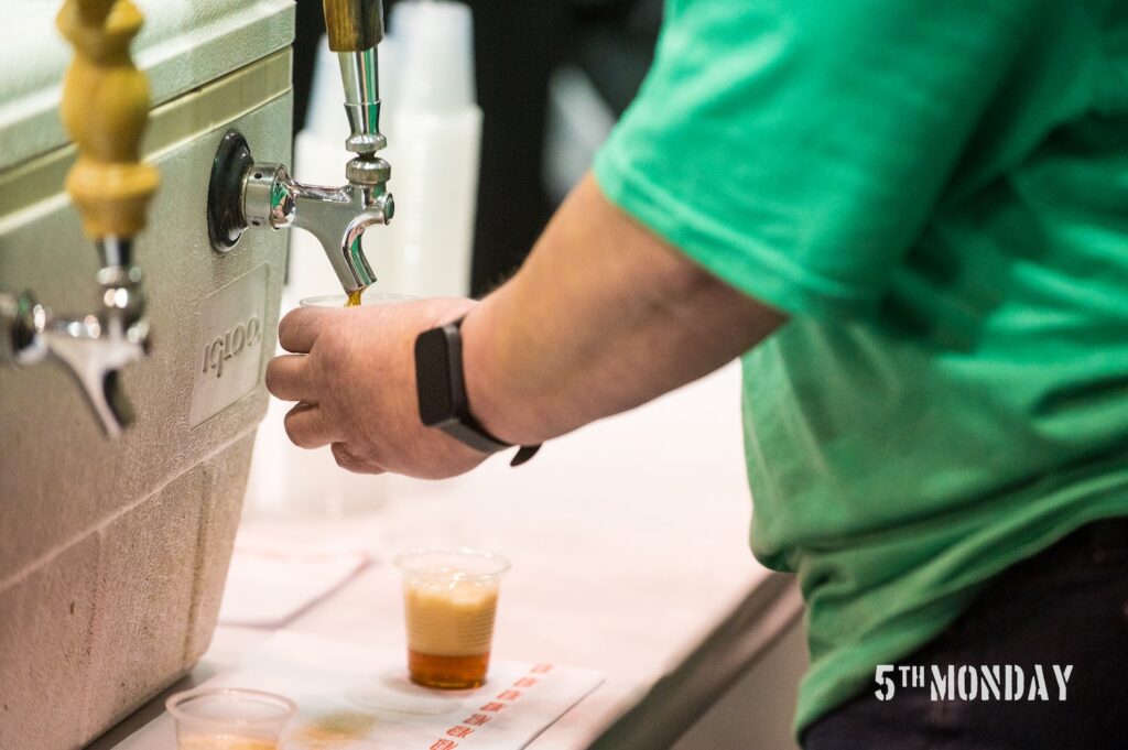 Photo of beer being poured from a tap at the Von Brewski Beer Festival in South Hall