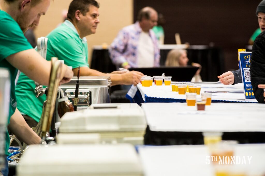 Photo of staff pouring samples at Von Brewski Beer Festival