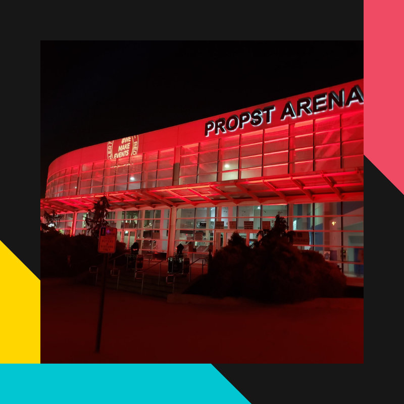 Exterior photo of VBC Propst Arena covered in red lights during Red Alert Restart